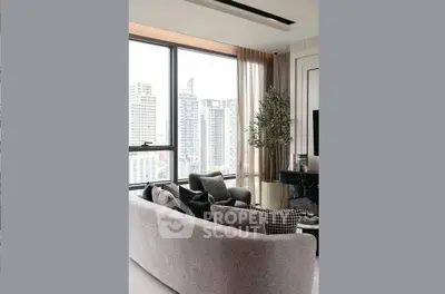 Luxurious living room with panoramic city view and modern decor