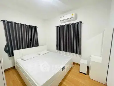 Modern bedroom with minimalist design and air conditioning