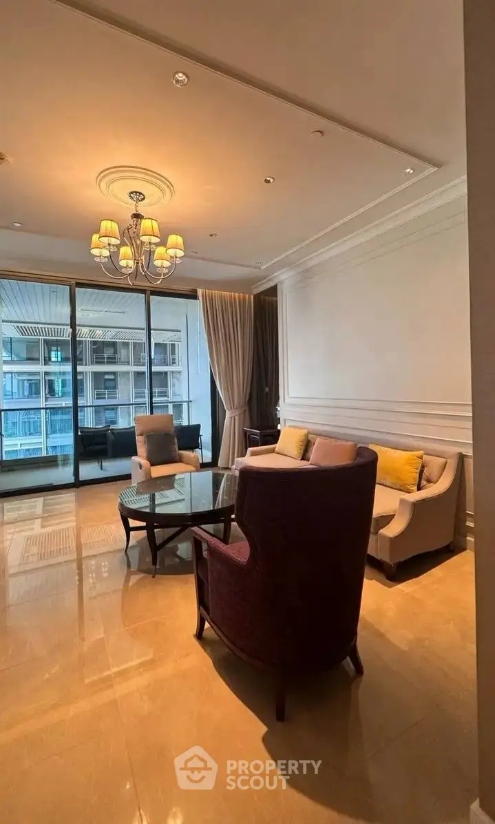 Luxurious living room with elegant furniture and large balcony view