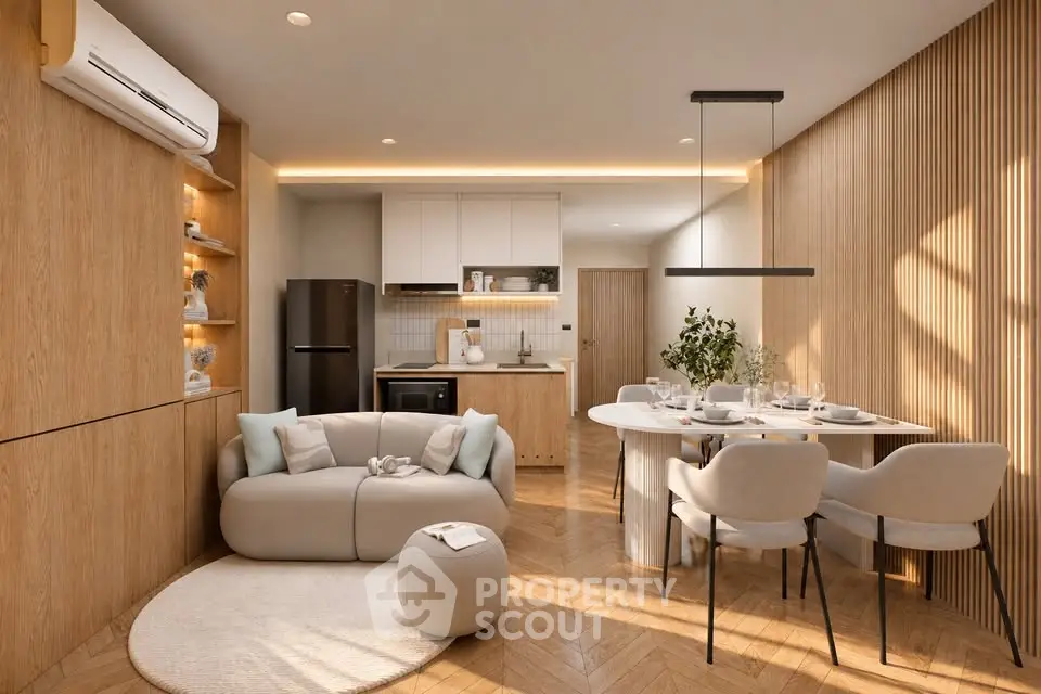 Modern open-plan living room with stylish dining area and kitchen, featuring elegant wood paneling and cozy seating.