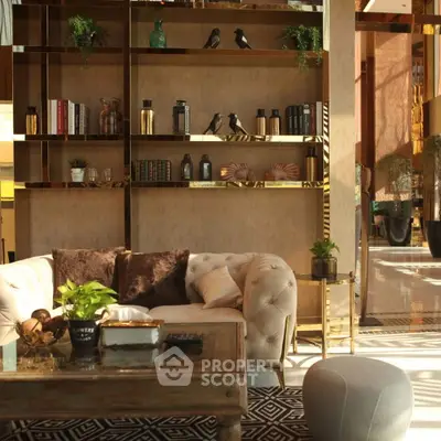 Luxurious living room with elegant decor and plush seating in a modern apartment.