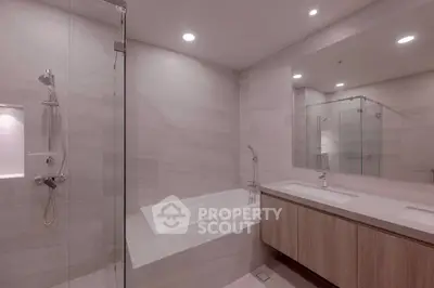 Luxurious modern bathroom with sleek design and spacious bathtub