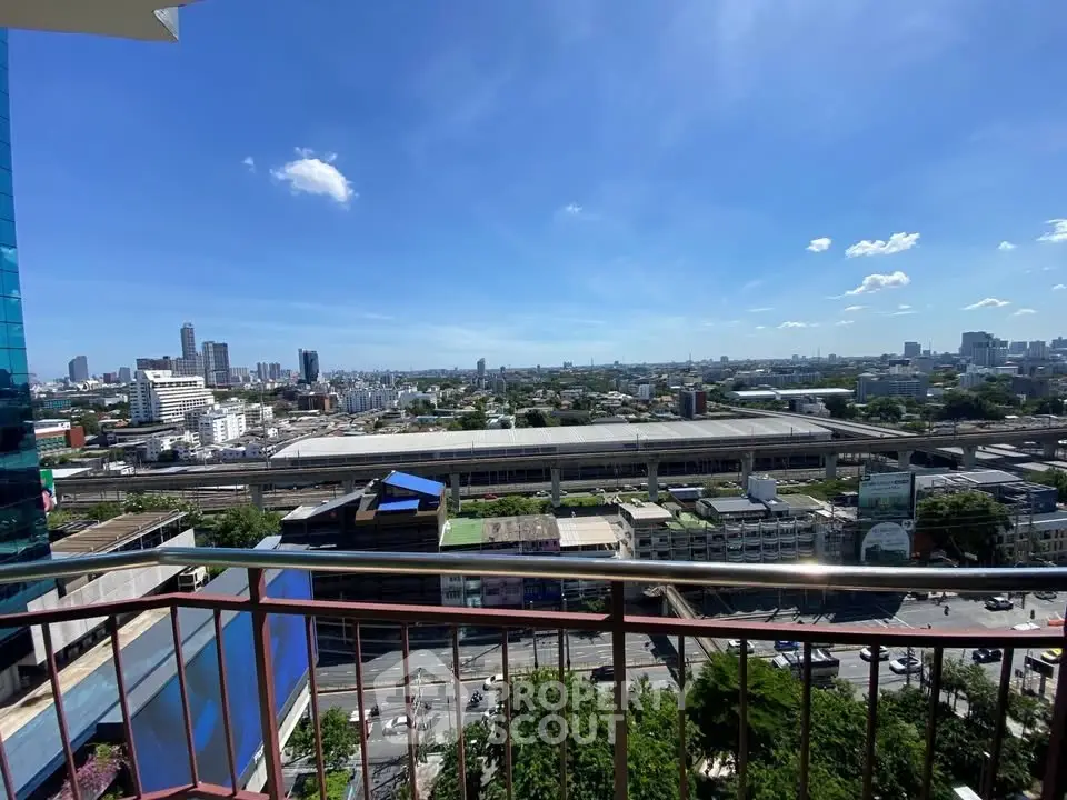 Stunning cityscape view from a high-rise balcony, perfect for urban living enthusiasts.