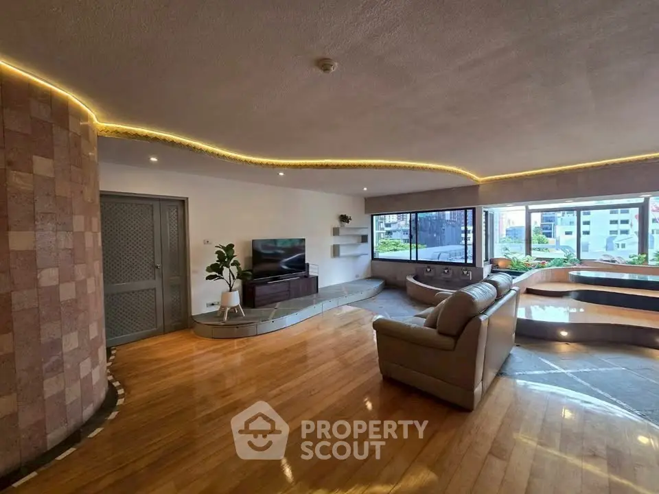 Spacious living room with modern design and panoramic city view