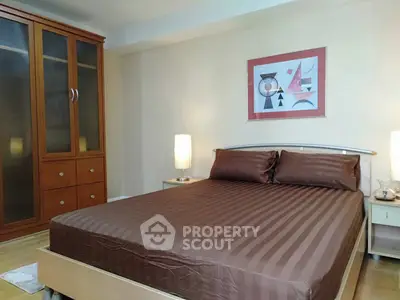 Cozy bedroom with modern decor and ample storage space