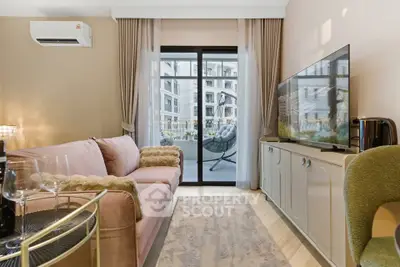 Stylish living room with balcony view in modern apartment