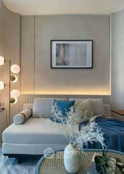 Stylish modern living room with elegant decor and cozy seating area.