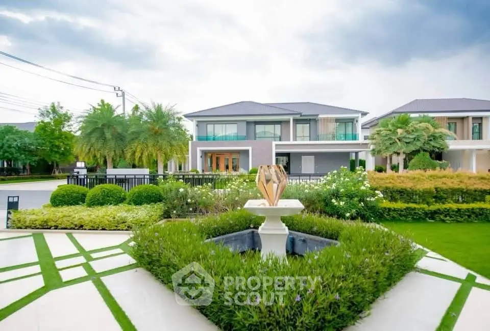 Luxurious modern house with manicured garden and elegant exterior design