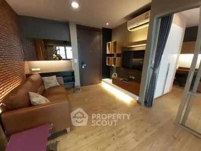 Modern living room with stylish decor and wooden flooring