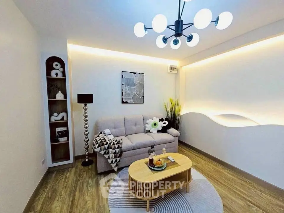 Stylish modern living room with chic lighting and cozy decor