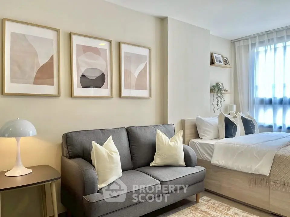 Stylish studio apartment with cozy living area and modern decor