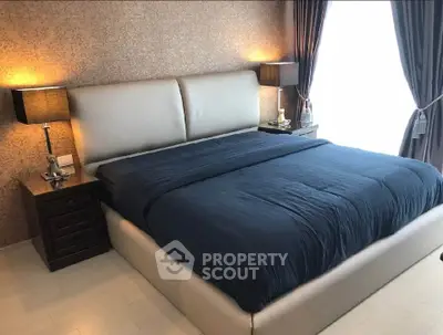 Luxurious bedroom with elegant decor and ambient lighting