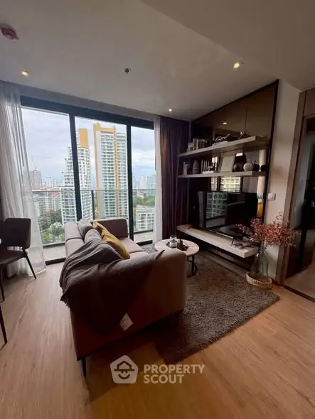 Modern living room with city view and stylish decor