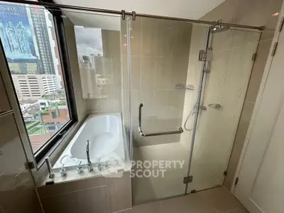 Luxurious bathroom with city view and modern glass shower