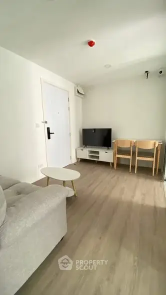 Modern living room with sleek furniture and natural light