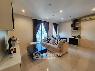 Spacious modern living room with city view and elegant decor