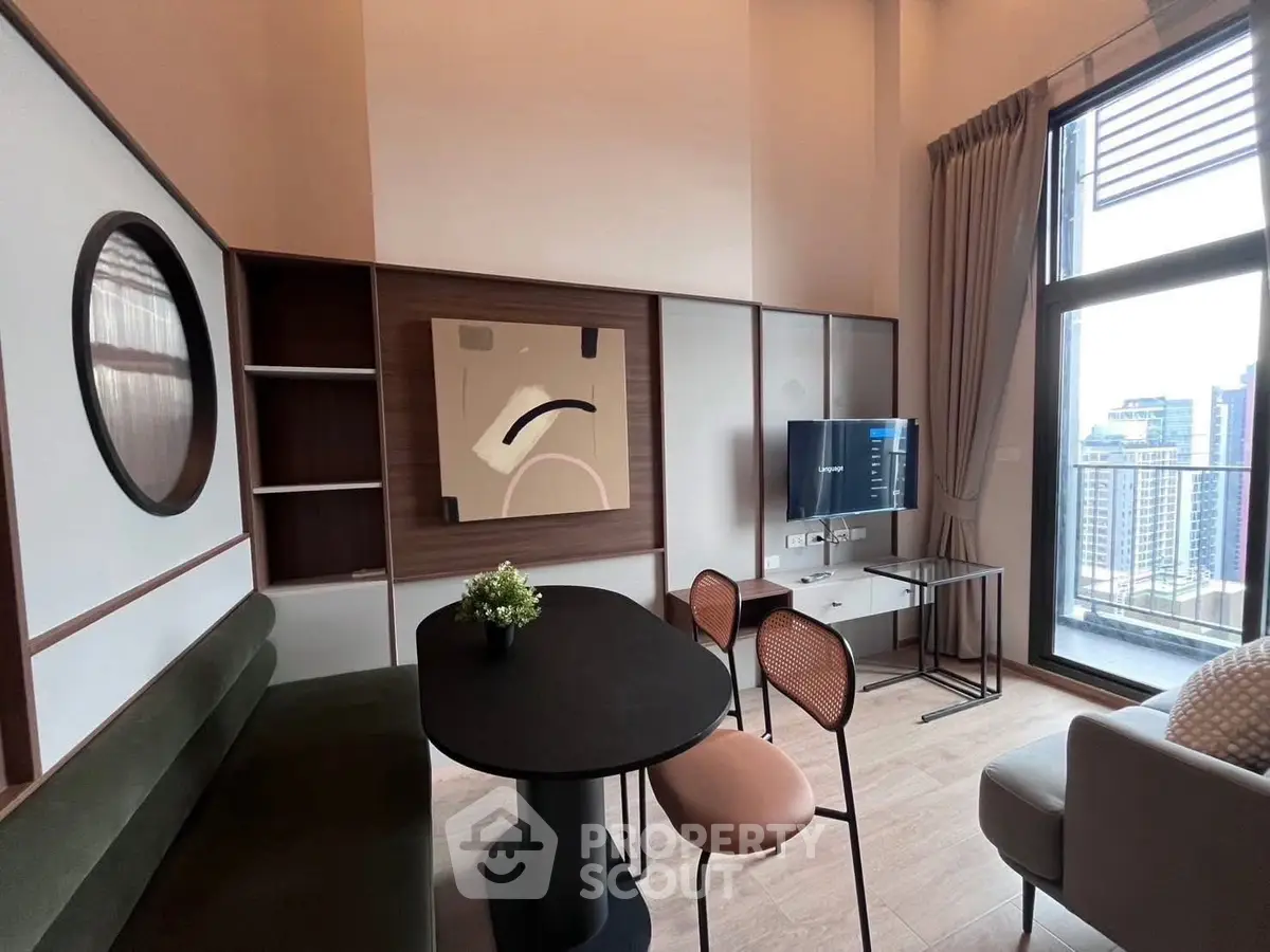 Modern living room with stylish decor and city view balcony
