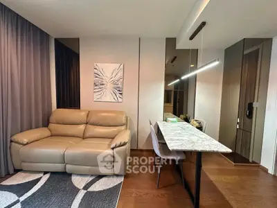 Modern living room with stylish sofa and elegant dining area