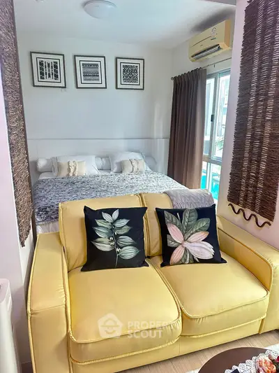 Cozy bedroom with stylish decor and yellow sofa in modern apartment