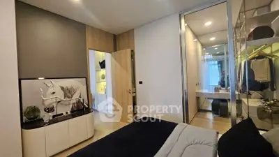 Modern bedroom with sleek design and built-in closet