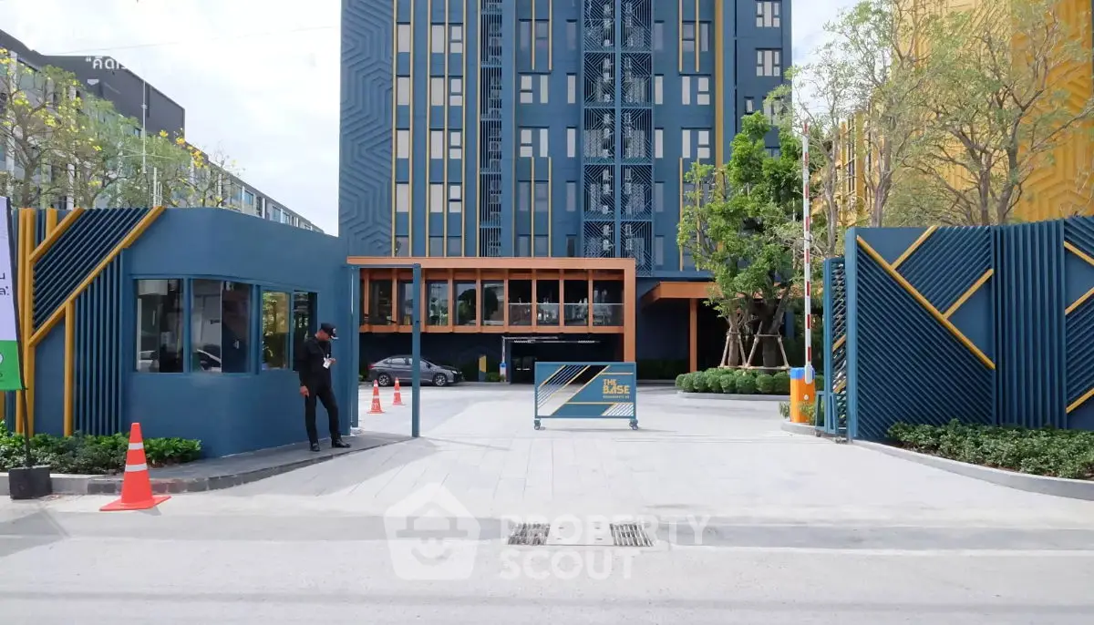Modern apartment building entrance with stylish design and security features