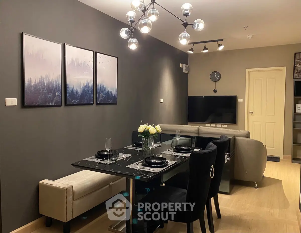 Modern living room with elegant dining area and stylish decor