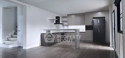Modern kitchen with sleek cabinetry and open layout design