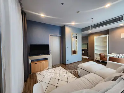 Spacious modern living room with cozy seating and stylish decor