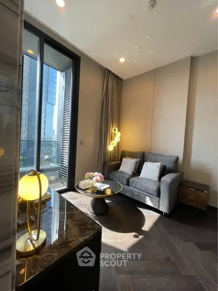 Luxurious living room with modern decor and large windows offering city views