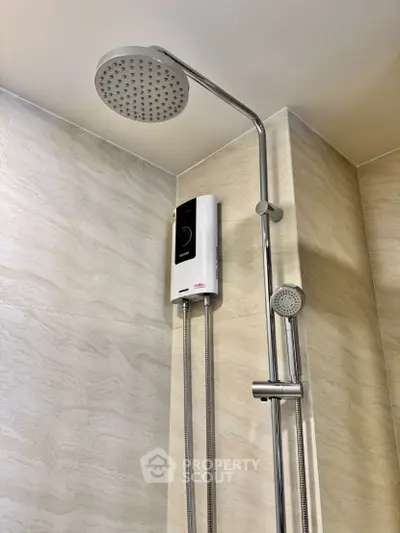 Modern bathroom with sleek showerhead and water heater installation.