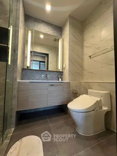 Modern bathroom with sleek fixtures and elegant tile design