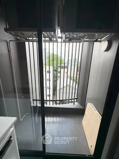 Modern balcony with city view and sleek design, perfect for urban living.