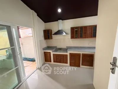 Spacious kitchen with modern cabinetry and open layout design