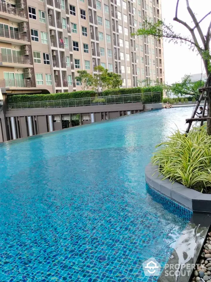 Luxurious condominium with stunning swimming pool and modern architecture