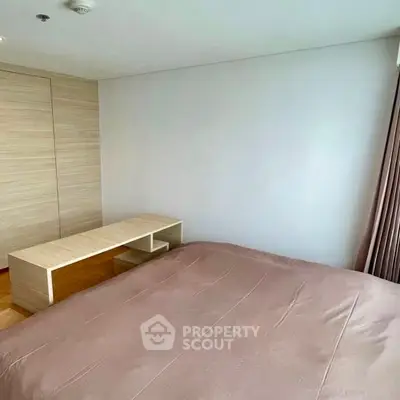 Cozy bedroom with modern minimalist design and natural light