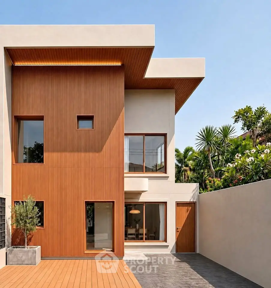 Modern architectural home with wooden facade and lush garden, showcasing contemporary design and outdoor elegance.
