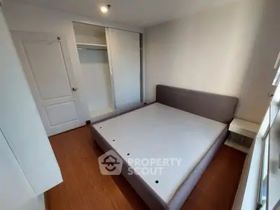 Spacious bedroom with modern design and ample closet space