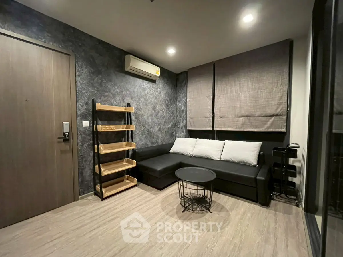 Modern living room with stylish decor and cozy seating area.