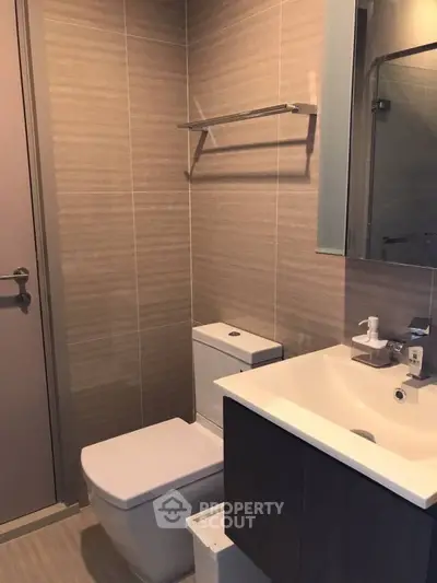 Modern bathroom with sleek fixtures and neutral tones