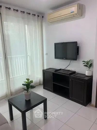 Modern living room with air conditioning and sleek furniture