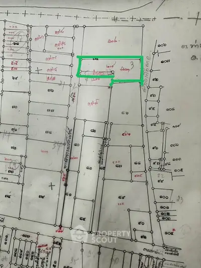 Detailed real estate schematic plan with marked plots and measurements.