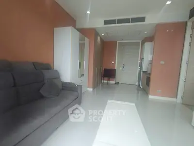 Modern living room with sleek design and stylish furniture in a contemporary apartment.