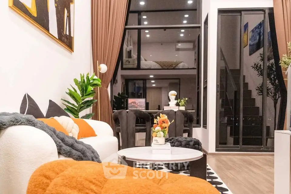 Stylish modern living room with high ceilings and chic decor