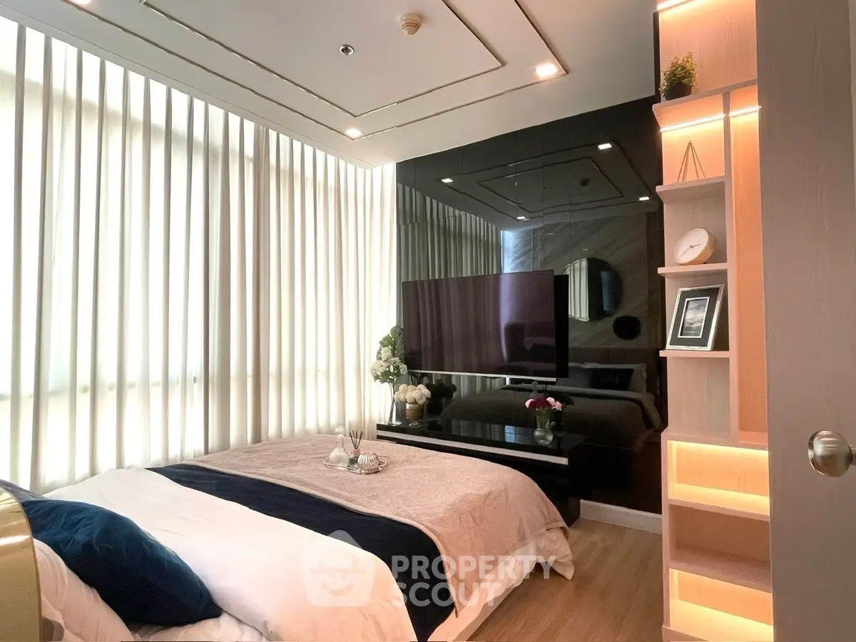 Luxurious modern bedroom with sleek design and ambient lighting