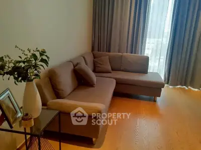 Cozy living room with stylish sofa and elegant decor