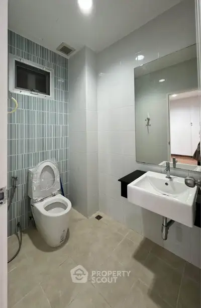 Modern bathroom with sleek fixtures and stylish tile design