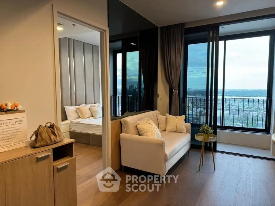 Modern apartment living room with balcony and city view