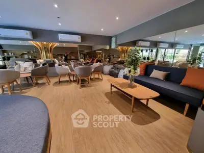 Spacious modern living room with elegant seating and stylish decor