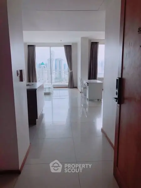 Spacious apartment with stunning city view and modern open layout.