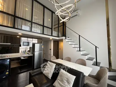 Luxurious modern duplex with open kitchen and stylish staircase